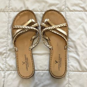 Gold flip flop sandals. Free gift with purchase.